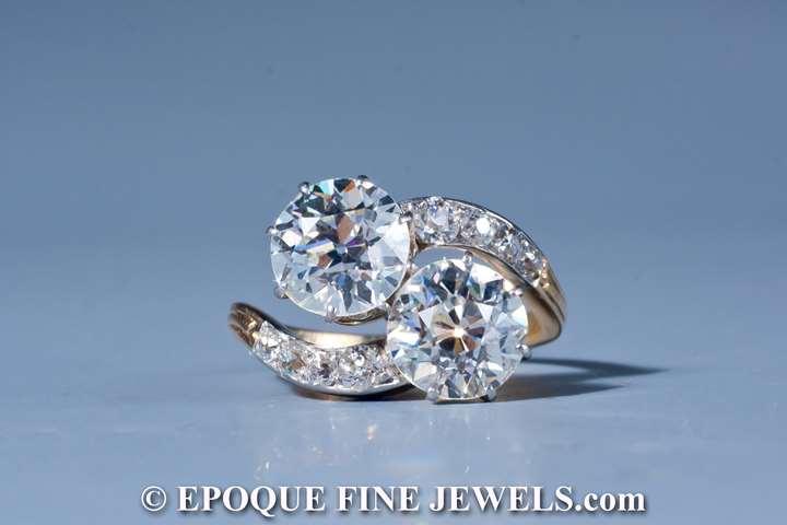 An Edwardian diamond cross over ring,